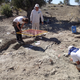 Team members mapping bones at the site.